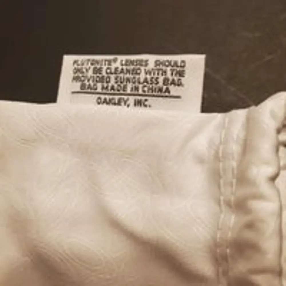 Oakley pouch drawstring bag cleaning cloth white. Perfect shape. Size 6.5